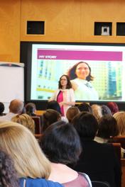 Maria Perlman Delivering a Coaching Session to a group of people